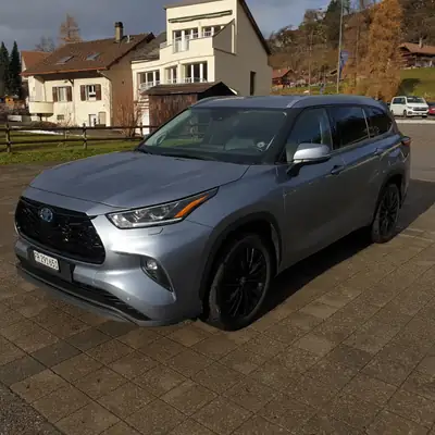 Toyota Highlander 2.5 HSD Premium — SUV 7 places hybride, 71 500 km seulement — côté