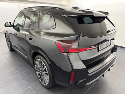 BMW X1 xDrive20d 48V M Sport Pro — SUV compact premium diesel hybride, quasi-neuf — side view