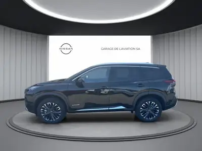 Nissan X-Trail 1.5e-Power 4WD — SUV hybride essence, 2500 km seulement — vista posteriore