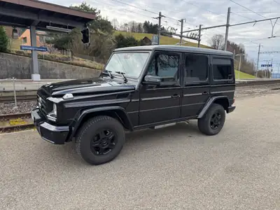 Mercedes-Benz G 500 — Le SUV légendaire avec 422 ch, entretien neuf et faible kilométrage — side view