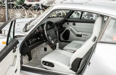Porsche 911 Carrera 4S 1995 — Coupé sportif iconique, première main avec historique complet — Miniatura 7