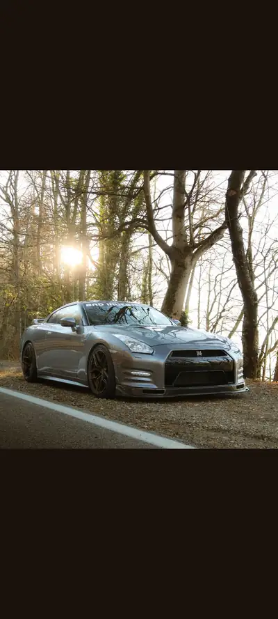 Nissan GT-R 3.8 V6 Biturbo — Supercar légendaire, 660 ch et 120'000 km — Seitenansicht