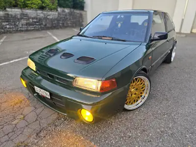 Mazda 323 GT-R 4WD 1993 — Légende de l'homologation sportive, 229 ch et transmission intégrale — rear view