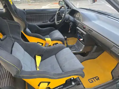 Mazda 323 GT-R 4WD 1993 — Légende de l'homologation sportive, 229 ch et transmission intégrale — Thumbnail 11