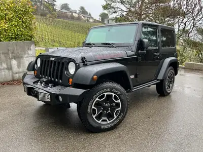 Jeep Wrangler 3.6 Rubicon — Légende 4x4, moteur V6 puissant et intérieur rouge sportif — Detail