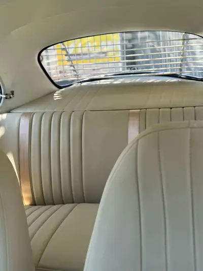 Volkswagen Käfer 1966 — Icône automobile vintage avec seulement 57'000 km — fianco