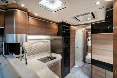 Concorde Cruiser 890 RLA — Camping-car de luxe 4 places, motorisation diesel puissante — Thumbnail 20