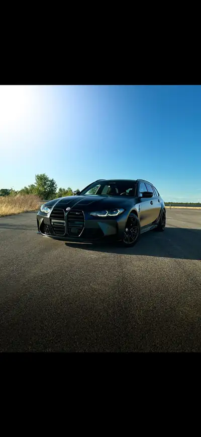 BMW M3 Touring xDrive Competition M — Break haute performance, 510 ch et faible kilométrage — Heckansicht