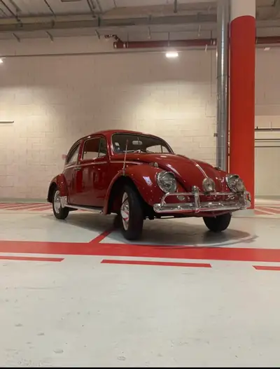 Volkswagen Käfer 1963 — Légende automobile rouge en état préservé — fianco