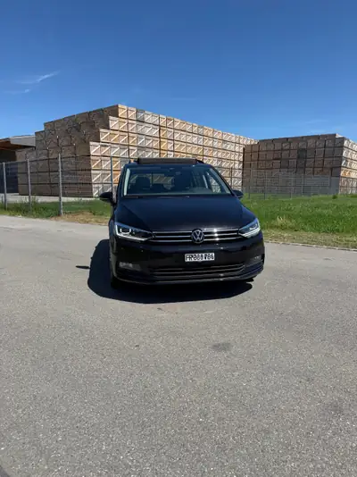 VW Touran 1.5 TSI EVO Comfortline — Monospace 7 places fiable, entretien VW régulier — côté
