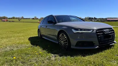 Audi A6 Avant 3.0 BiTDI V6 — Break luxe Quattro, 326 ch, consommation maîtrisée — Heckansicht