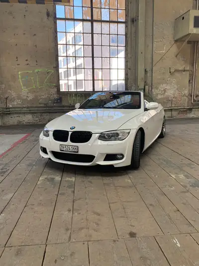 BMW 335i Cabriolet — Roadster sportif 2010, 306 ch et toit électrique — fianco