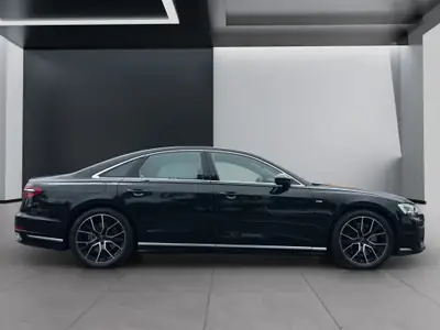 Audi A8 60 TFSI e quattro — Berline de luxe hybride rechargeable, 15'400 km seulement — rear view