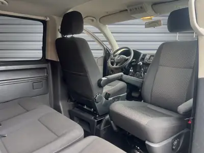 VW T6 Caravelle 2.0 TSI Comfortline 4Motion — Monospace 7 places, roulage bas, entretien complet — Miniature 9
