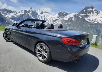 BMW 430i Cabriolet xDrive — Roadster sportif, intérieur premium noir — fianco