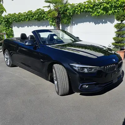 BMW 430i Cabriolet xDrive — Roadster sportif, intérieur premium noir — vista esterna