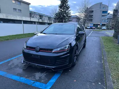 VW Golf 7 2.0 TSI GTI — Sportive performante, full black, échappement Remus — side view