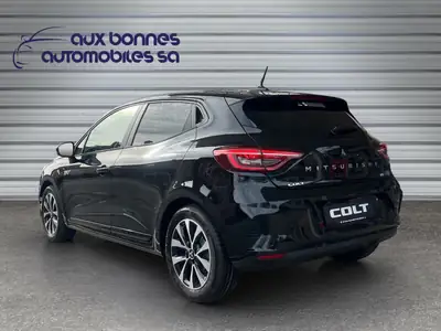 Mitsubishi Colt 1.6 HEV Invite+ — Hybride compact suisse, quasi neuf — côté