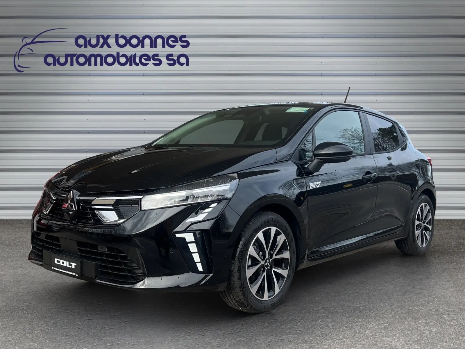 Mitsubishi Colt 1.6 HEV Invite+ — Hybride compact suisse, quasi neuf