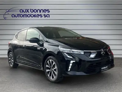 Mitsubishi Colt 1.6 HEV Invite+ — Hybride compact suisse, quasi neuf — intérieur