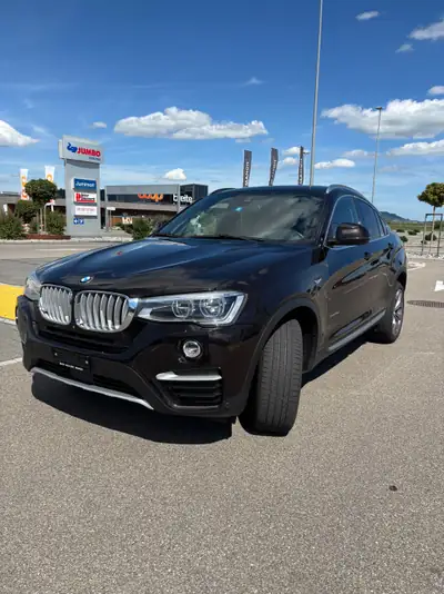 BMW X4 xDrive 30d xLine — SUV coupé premium diesel, entretien BMW, état impeccable — côté