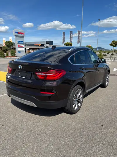 BMW X4 xDrive 30d xLine — SUV coupé premium diesel, entretien BMW, état impeccable — tableau de bord