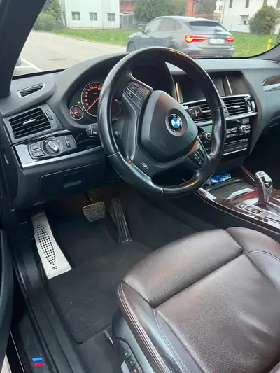 BMW X3 xDrive 35d M Series — SUV premium diesel, 165'000 km, sans sinistre — side view