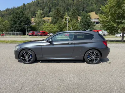 BMW M135i xDrive — Compacte sportive 320 ch, transmission intégrale automatique — rear view