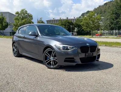 BMW M135i xDrive — Compacte sportive 320 ch, transmission intégrale automatique — exterior view