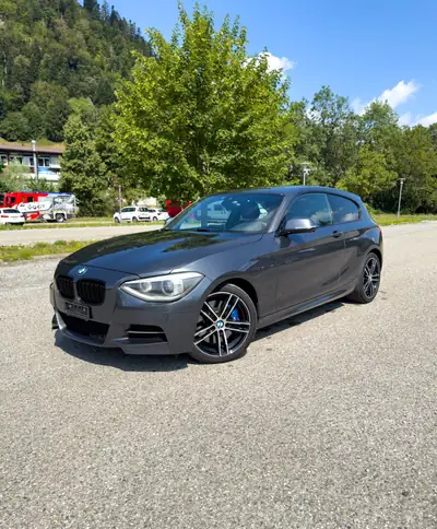 BMW M135i xDrive — Compacte sportive 320 ch, transmission intégrale automatique — side view