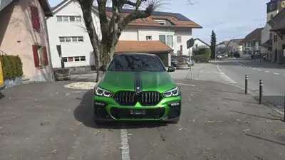 BMW X6 xDrive 40d M Sport — SUV coupé diesel hybride 340 ch, 48 000 km seulement — fianco