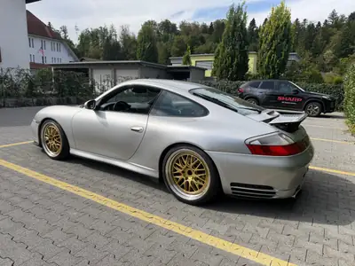Porsche 911 Carrera 4 S — Coupé sportif légendaire, 320 ch, transmission manuelle — côté