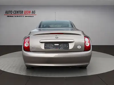 Nissan Micra C+C 1.4 Acenta — Cabriolet convivial, climat et toit électrique — dashboard
