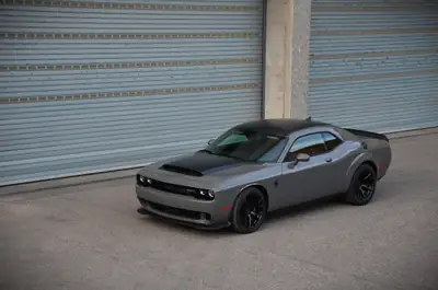 Dodge Challenger Demon 170 — Muscle-car ultime 1025 ch, roues carbone d'usine, faible kilométrage — côté