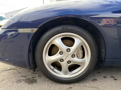 Porsche 911 Carrera 4 2004 — Coupé sportif mythique, 320 ch et 8 pneus — Miniature 14
