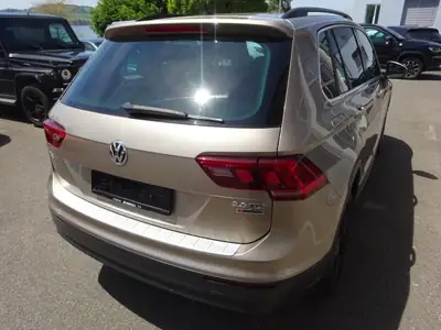 VW Tiguan 2.0 TDI SCR Sound 4Motion — SUV robuste 150 ch, 115'000 km, toutes routes — rear view