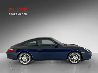 Porsche 911 Carrera Targa 2004 — Icône décapotable, moteur révisé, histoire complète — côté