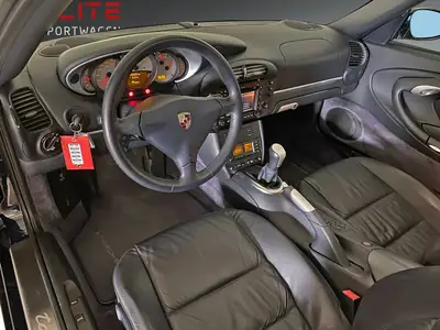 Porsche 911 Carrera Targa 2004 — Icône décapotable, moteur révisé, histoire complète — détail