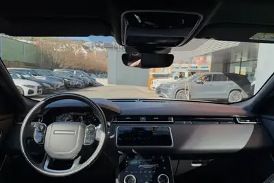 Land Rover Range Rover Velar 2.0 D 240 — SUV premium diesel, traction intégrale, faible kilométrage — side view