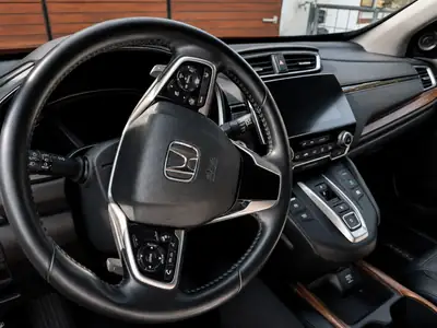 Honda CR-V 2.0i MMD Hybrid Executive 4WD — Efficacité hybride et traction intégrale — Heckansicht