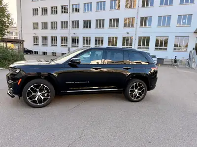 Jeep Grand Cherokee Summit Reserve 4x4 — V6 3.6L premium, 299 PS, très faible kilométrage — rear view