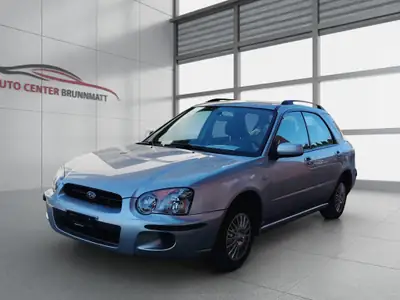 Subaru Impreza 1.6 Cool — Berline polyvalente avec transmission automatique et 4x4 intégral — exterior view
