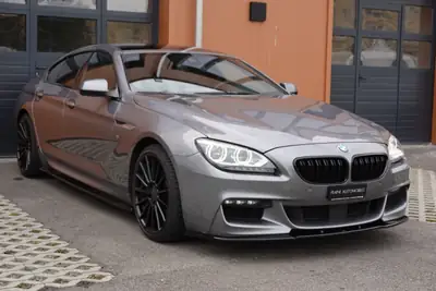 BMW 640i Gran Coupé xDrive — Coupé 4 portes premium, toit ouvrant et technologie Head-Up — côté