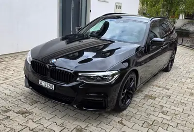 BMW 520d xDrive Touring — Break premium diesel, équipement M Sport complet — exterior view