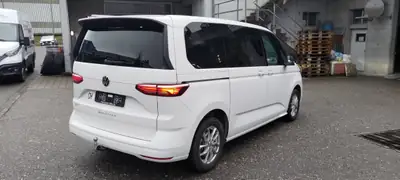 VW T7 Multivan 2.0 TDI DSG — Monospace 7 places, diesel efficace et spacieux — côté