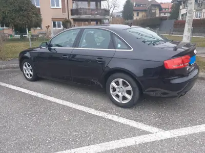 Audi A4 Limousine 1.8 TFSI — Berline polyvalente, 27'000 km, transmission stepless — fianco