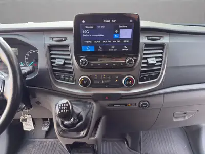 Ford Transit Custom 320 L2H1 — Van 9 places robuste, diesel économique et sans accident — Thumbnail 15