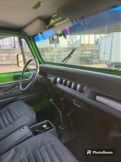 Jeep Wrangler 4.0 Laredo 1994 — Légende 4x4 typée, moteur essence performant — vista posteriore