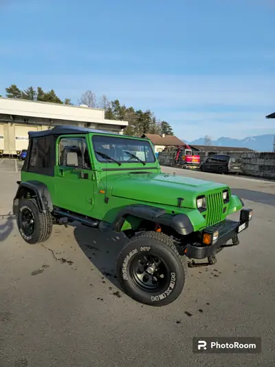 Jeep Wrangler 4.0 Laredo 1994 — Légende 4x4 typée, moteur essence performant — vista esterna