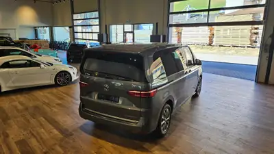 VW T7 Multivan 1.5 eHybrid Style 4Motion — Minibus hybride rechargeable, 7 places, quasi neuf — Thumbnail 11